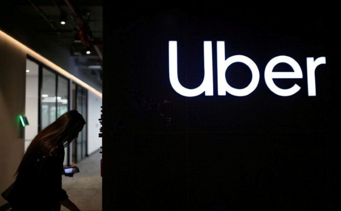 Uber's logo is pictured at its office in Bogota