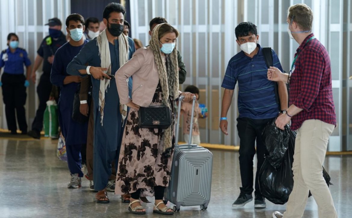 Afghan refugees arrive at Dulles Airport in Virginia