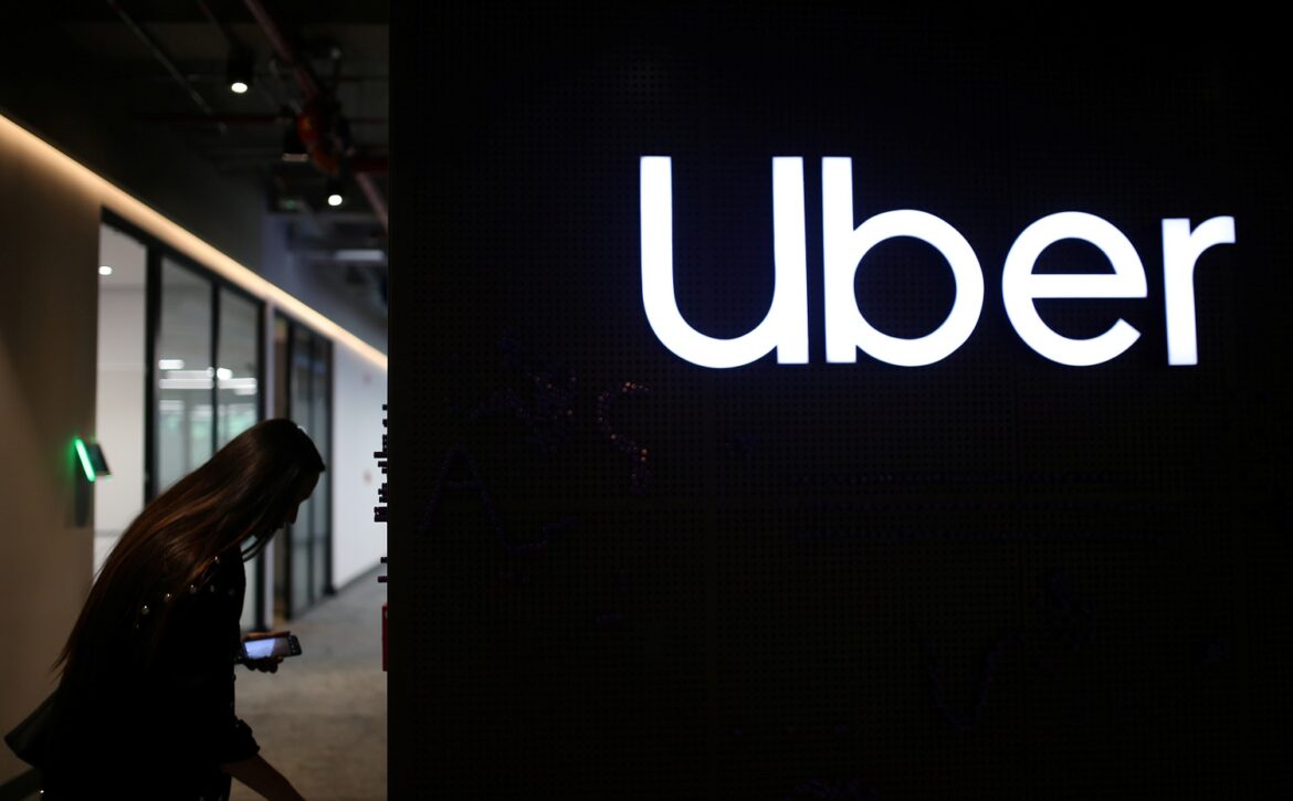 Uber's logo is pictured at its office in Bogota